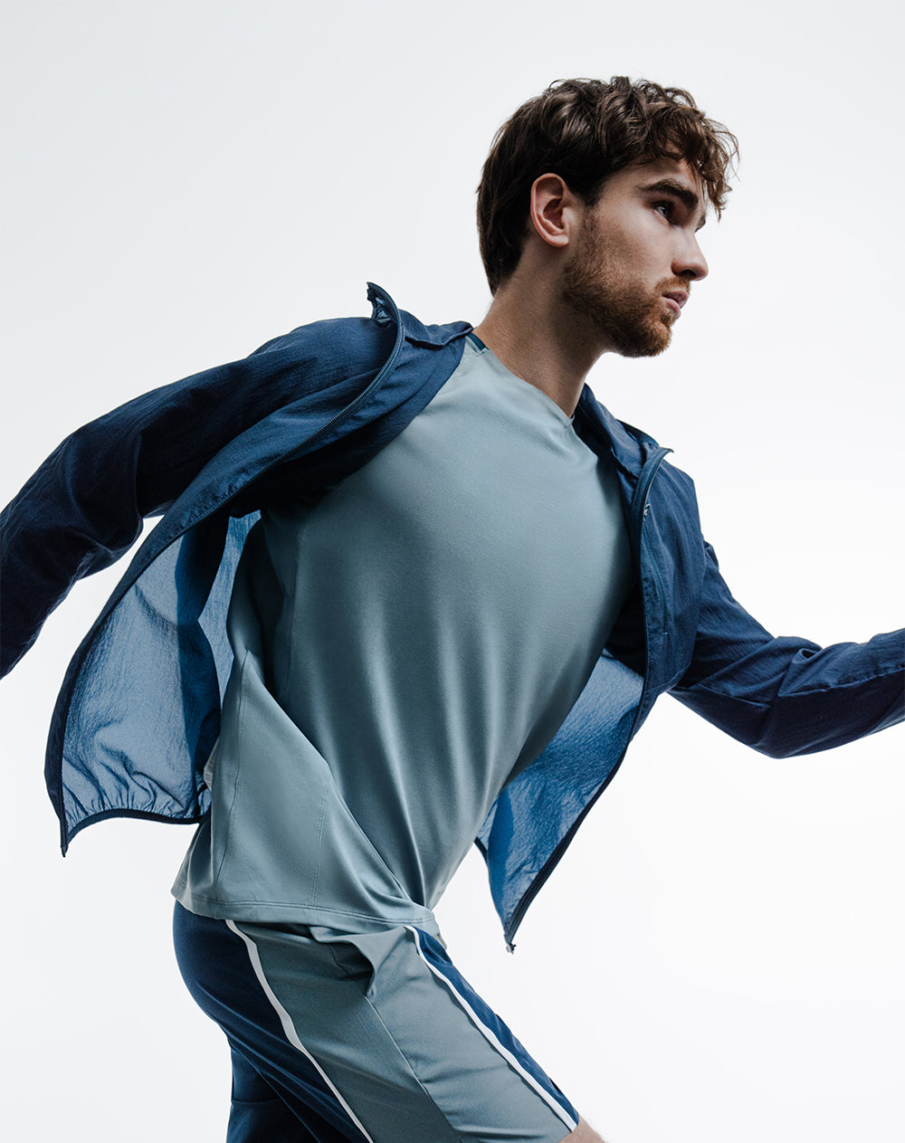 Chaqueta rompevientos regular azul hombre
