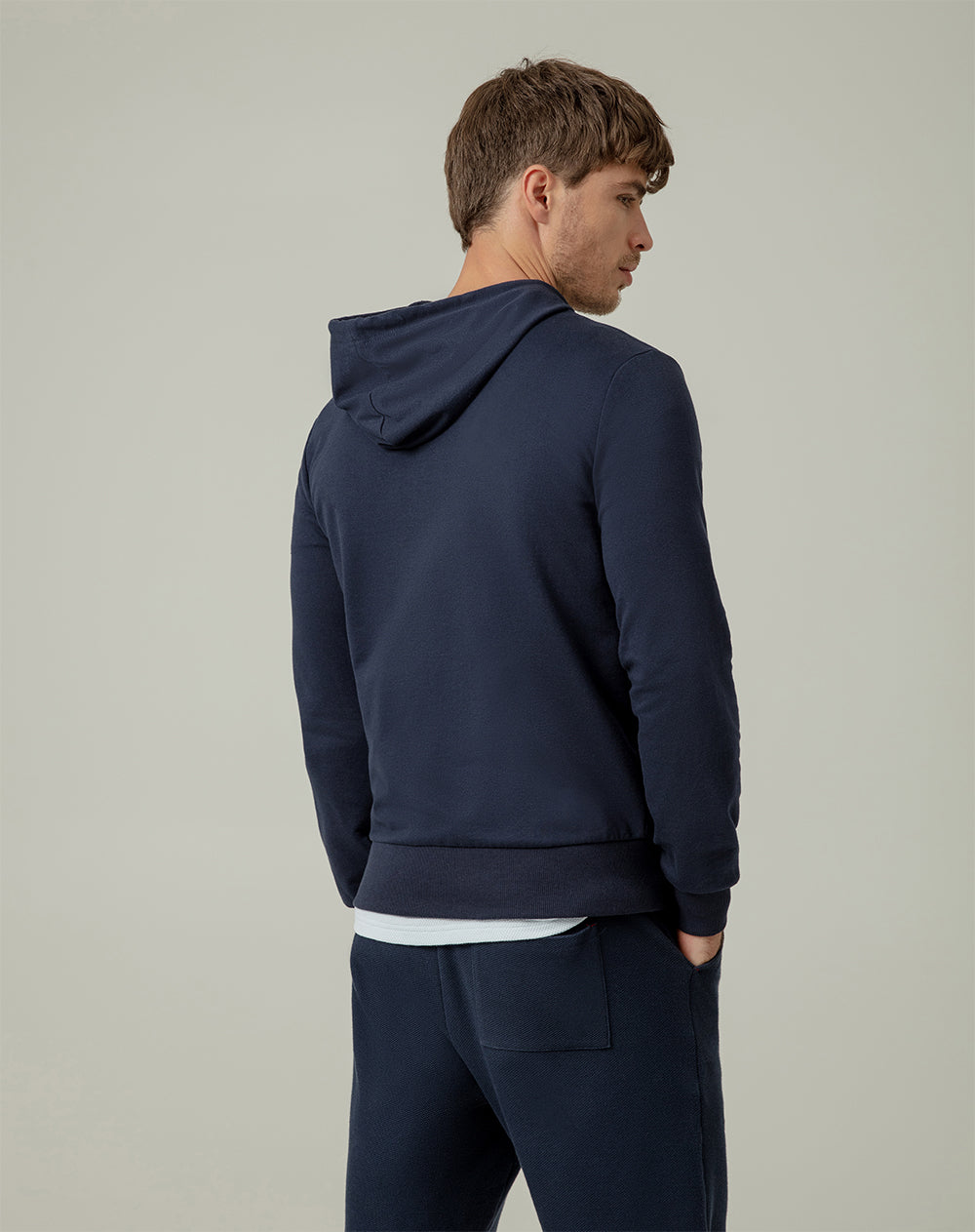 Chaqueta cierre y capucha azul oscuro hombre