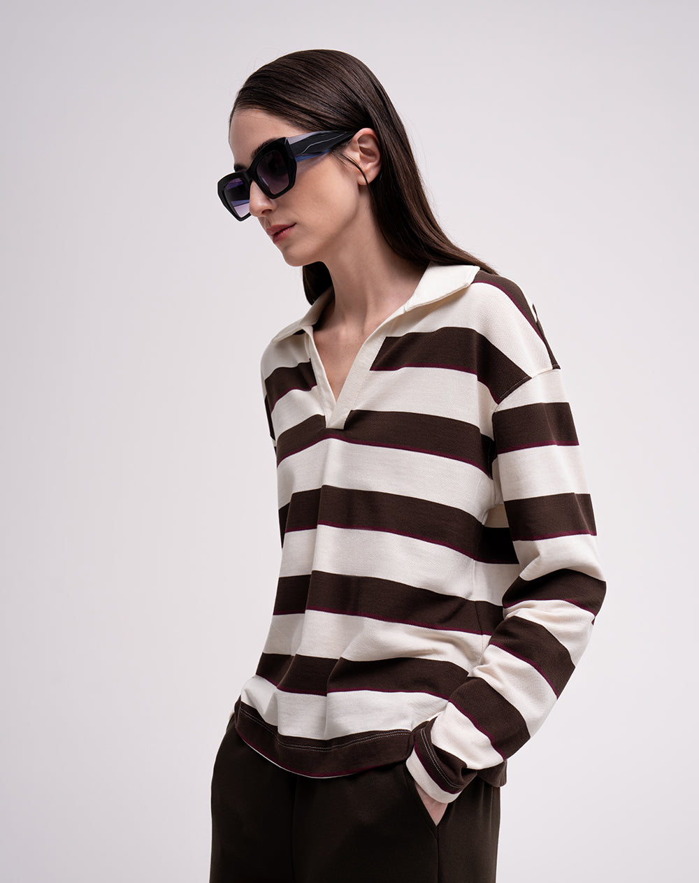 Buzo relaxed fit cafe rayas