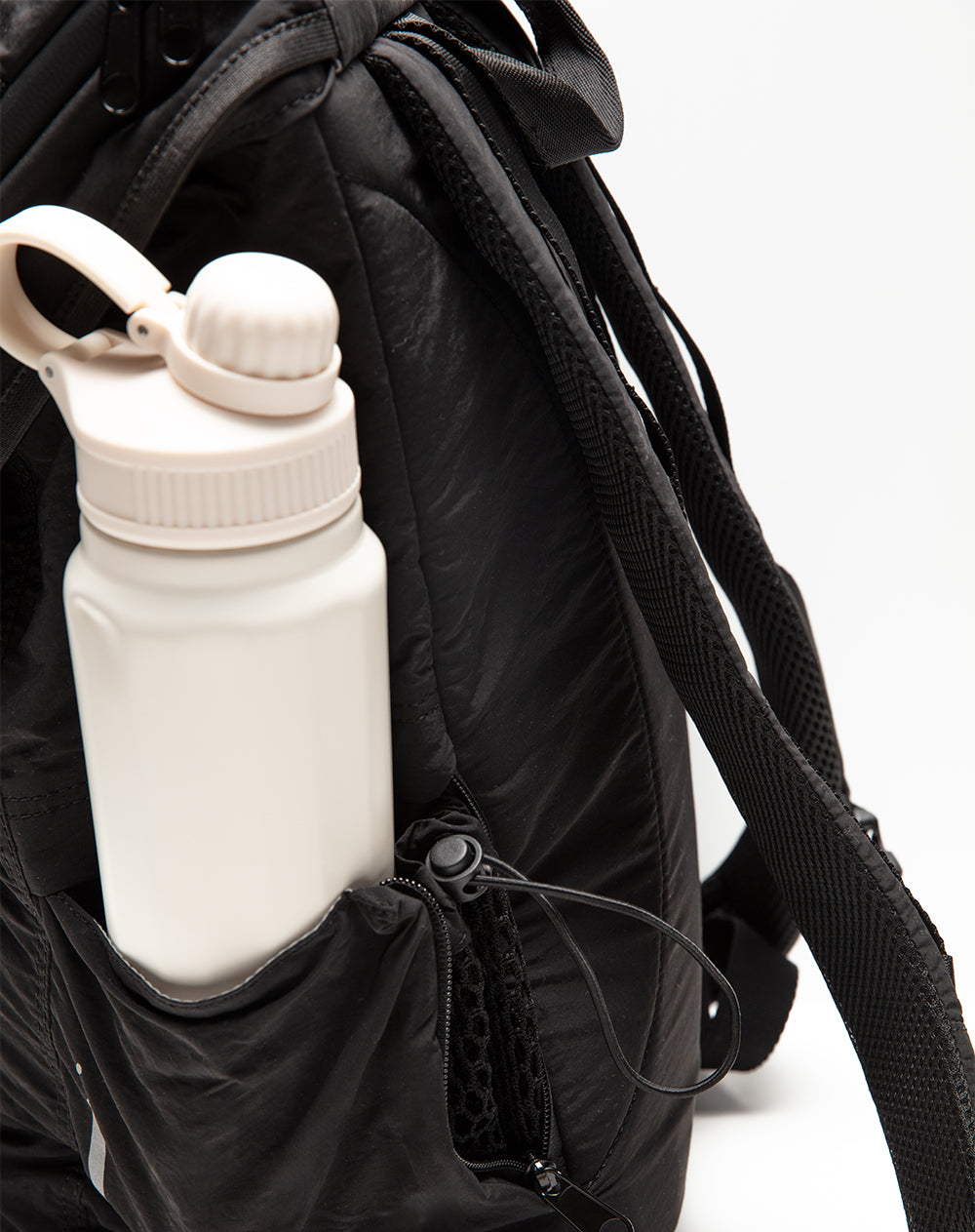 Morral unisex broche y tiras ajustables negro