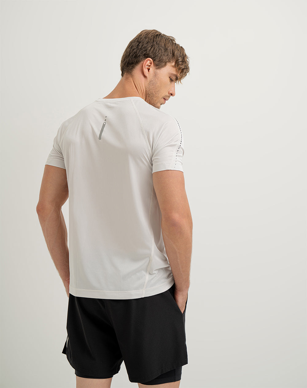 Camiseta deportiva hombre control humedad gris