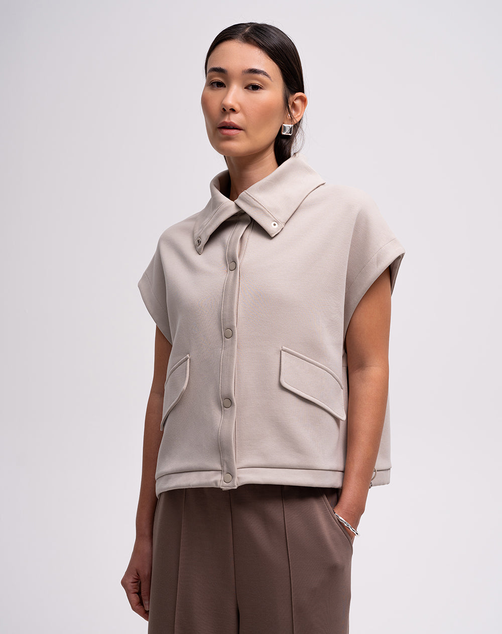 Chaleco confort oversize tacto suave arena mujer