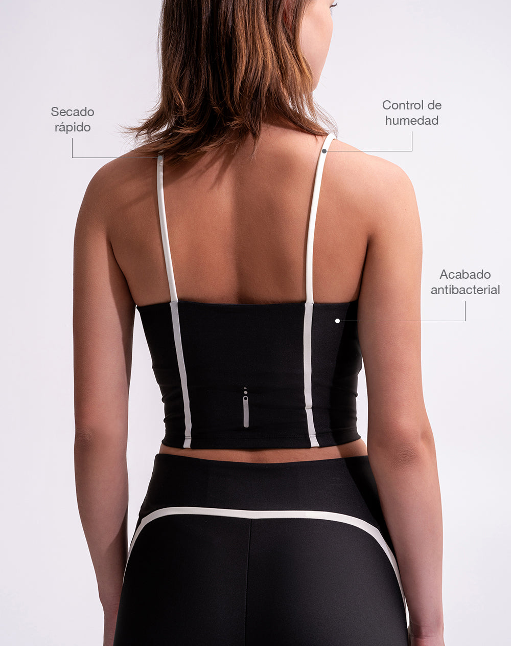 Top deportivo soporte medio control humedad negro