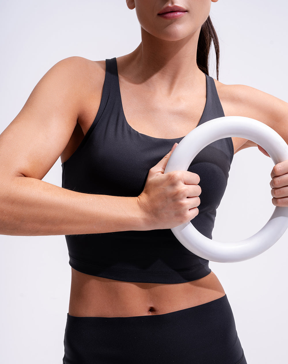 Top deportivo soporte medio control humedad negro