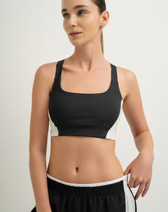 Top deportivo soporte alto control humedad negro