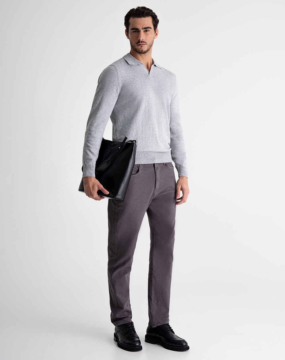 Buzo tipo polo regular fit tejido de punto gris hombre