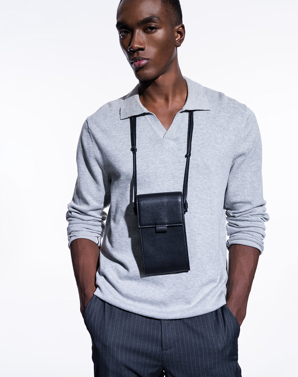 Buzo tipo polo regular fit tejido de punto gris hombre