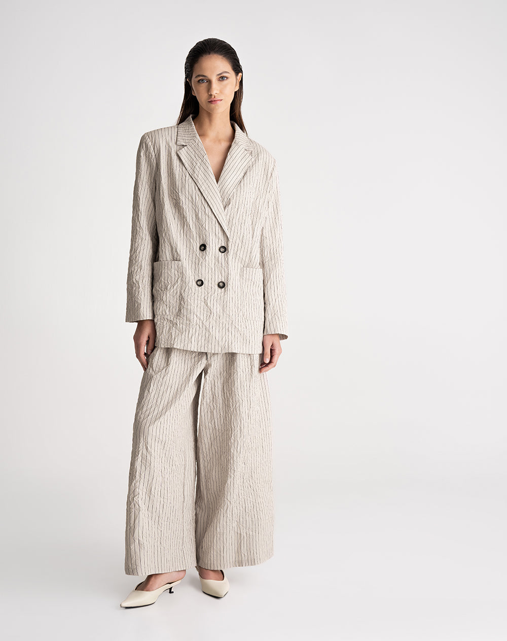 Pantalón palazzo tiro alto efecto arrugado habano rayas mujer