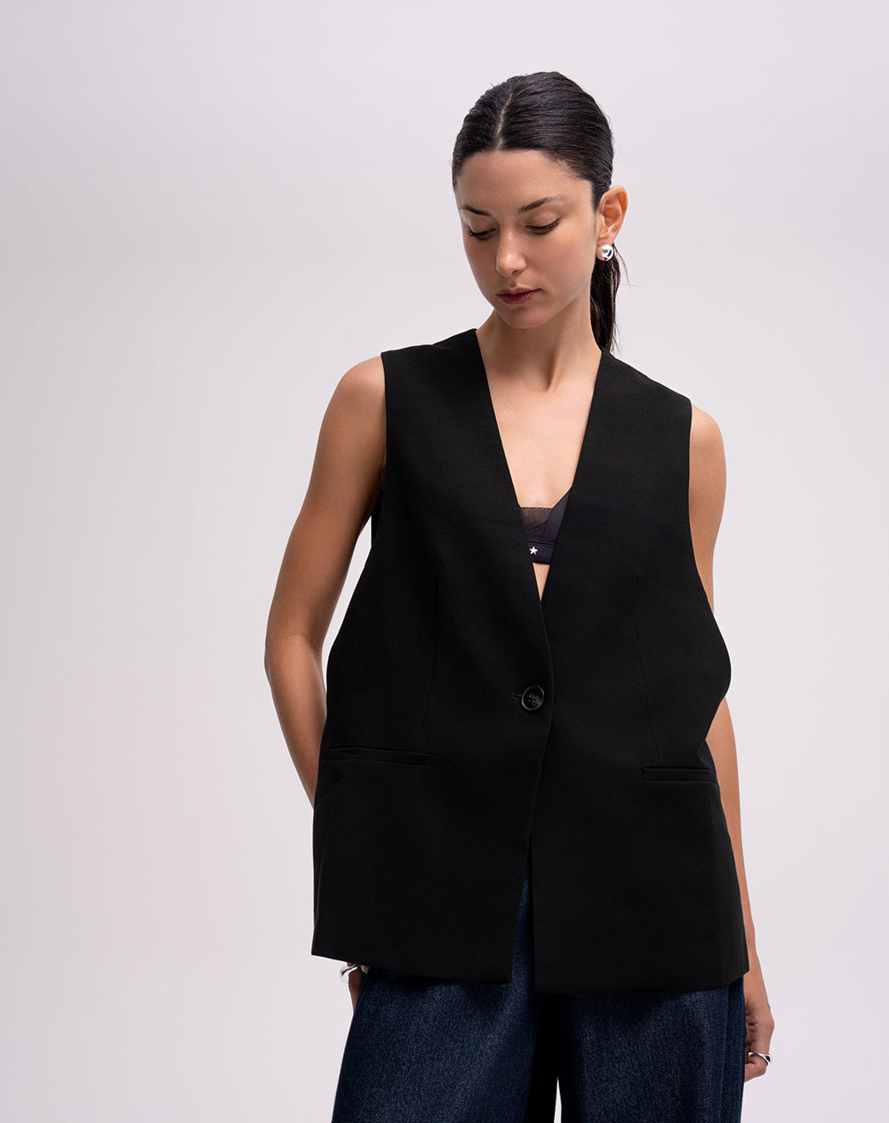 Chaleco tipo sastre oversize negro mujer
