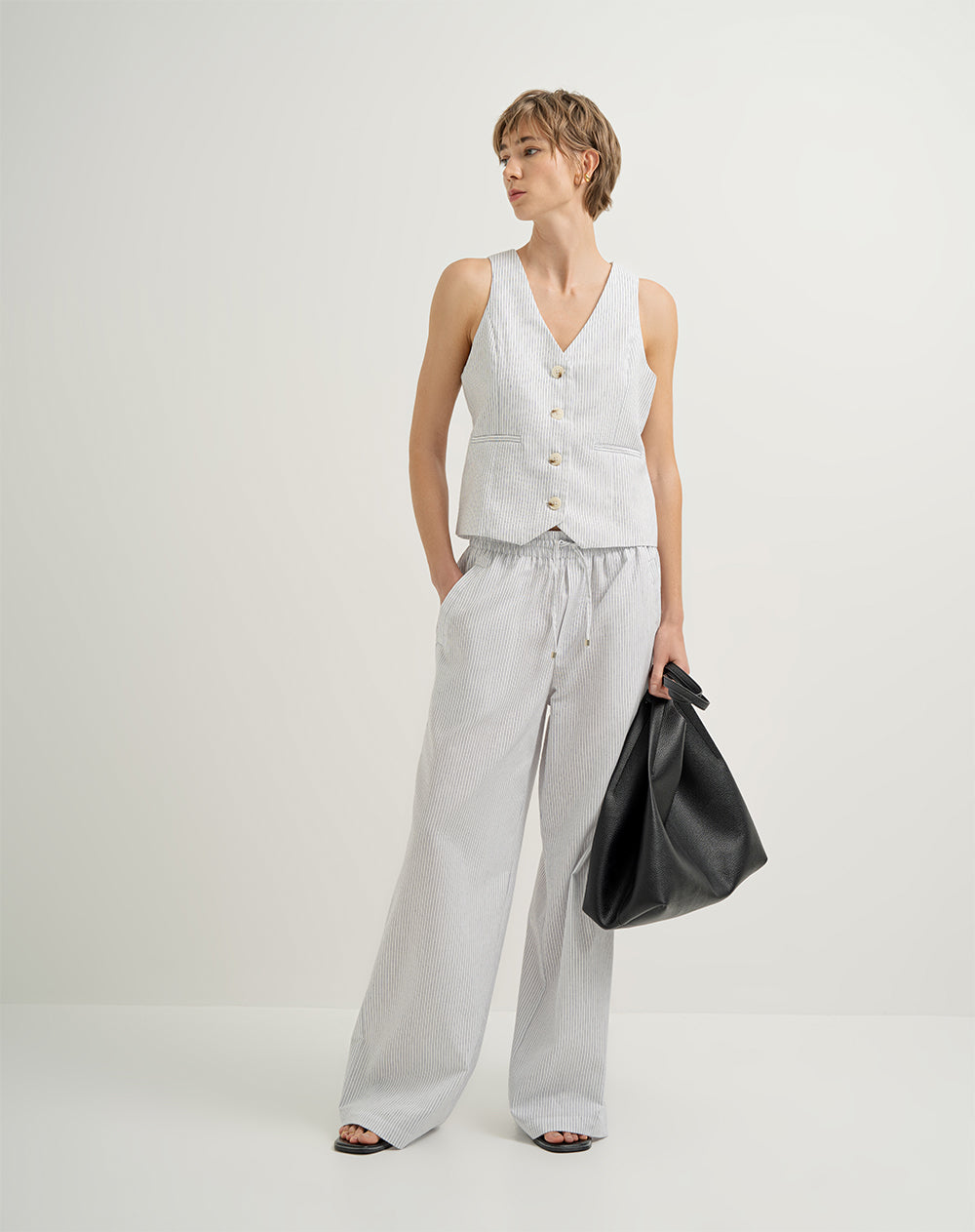 Pantalón tiro alto elástico en cintura rayas mujer