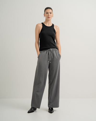 Pantalón tiro alto elástico en cintura gris mujer