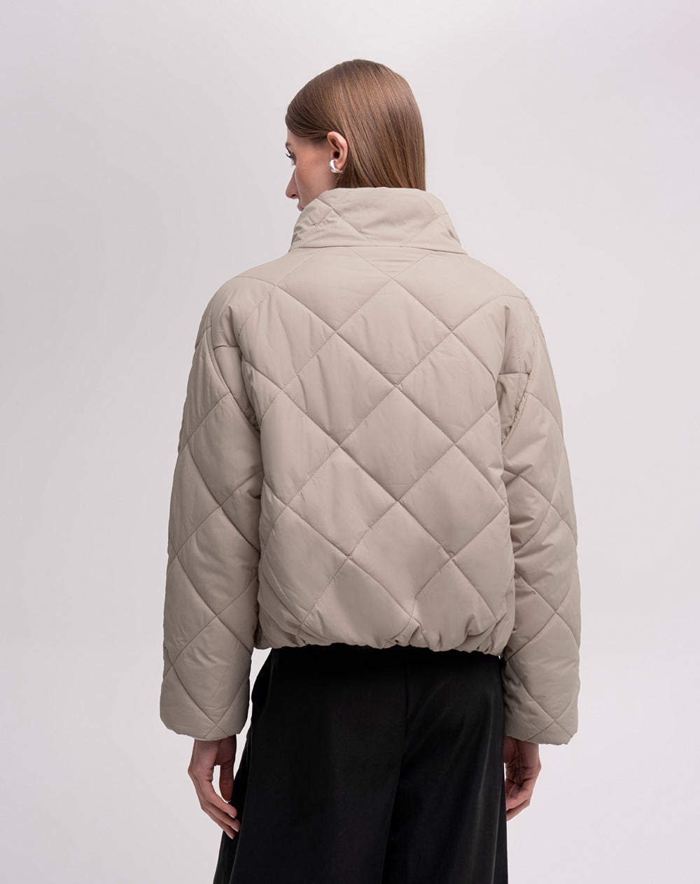 Chaqueta acolchada cuello alto avena mujer