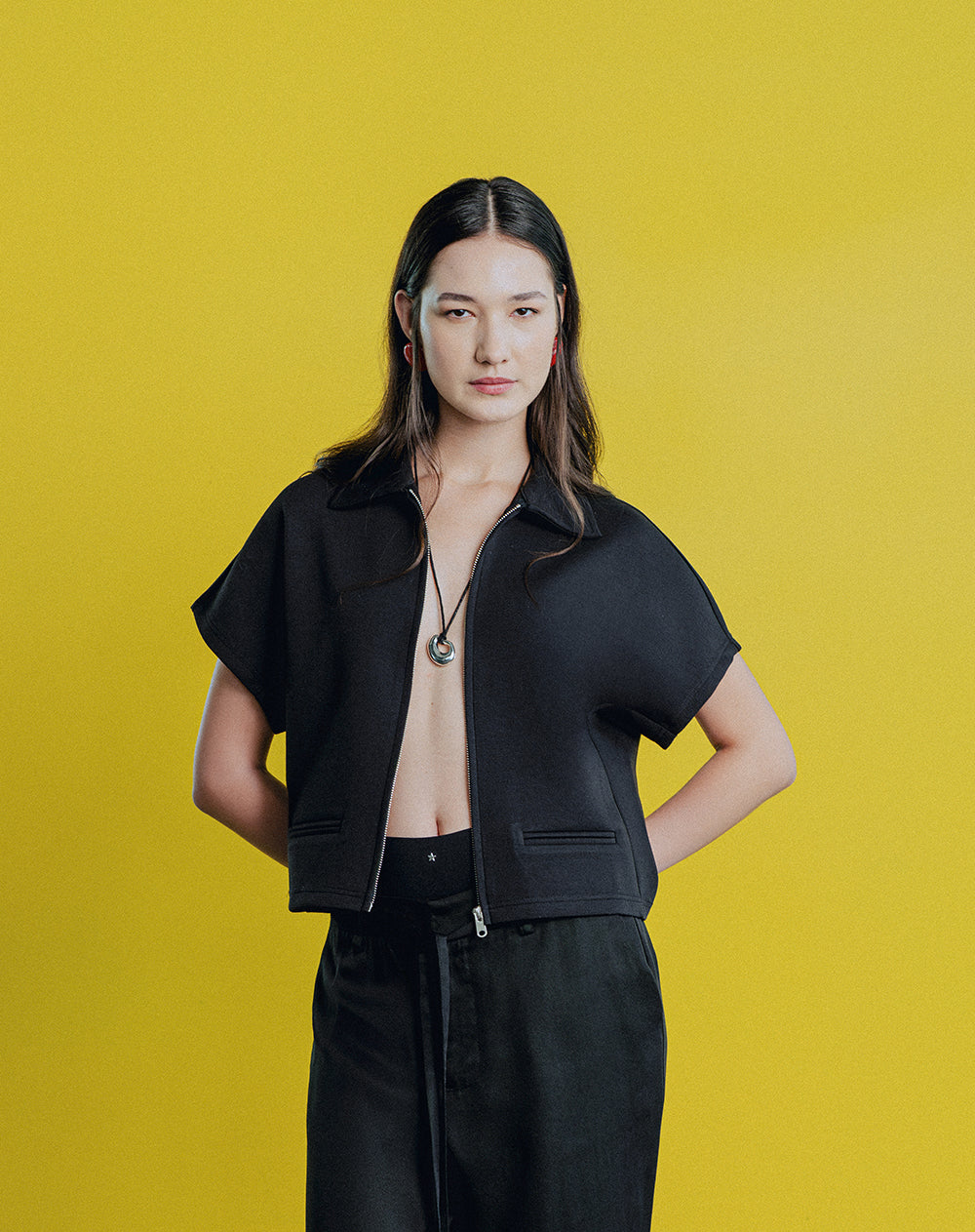 Chaleco oversize cremallera negro mujer