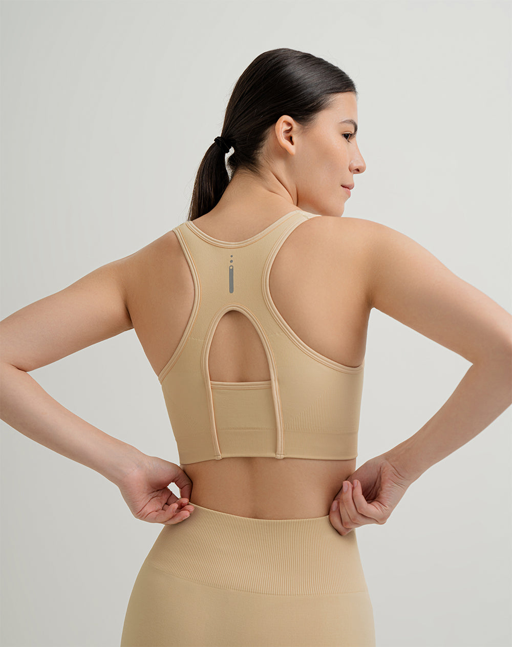 Top deportivo soporte alto seamless control humedad amarillo