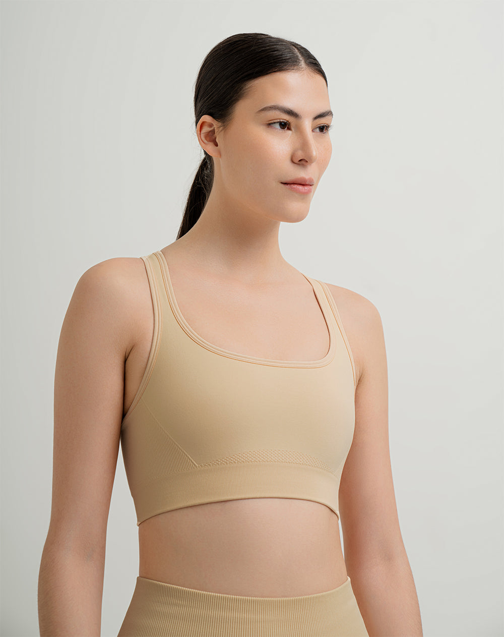 Top deportivo soporte alto seamless control humedad amarillo
