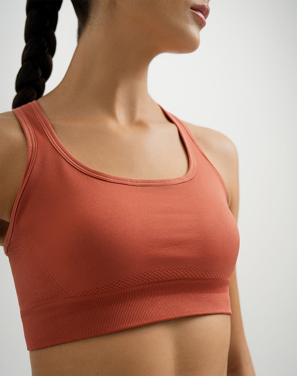 Top deportivo soporte alto seamless control humedad terracota