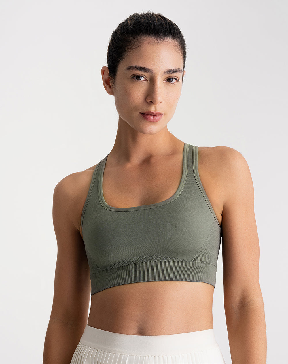 Top deportivo soporte alto seamless control humedad verde