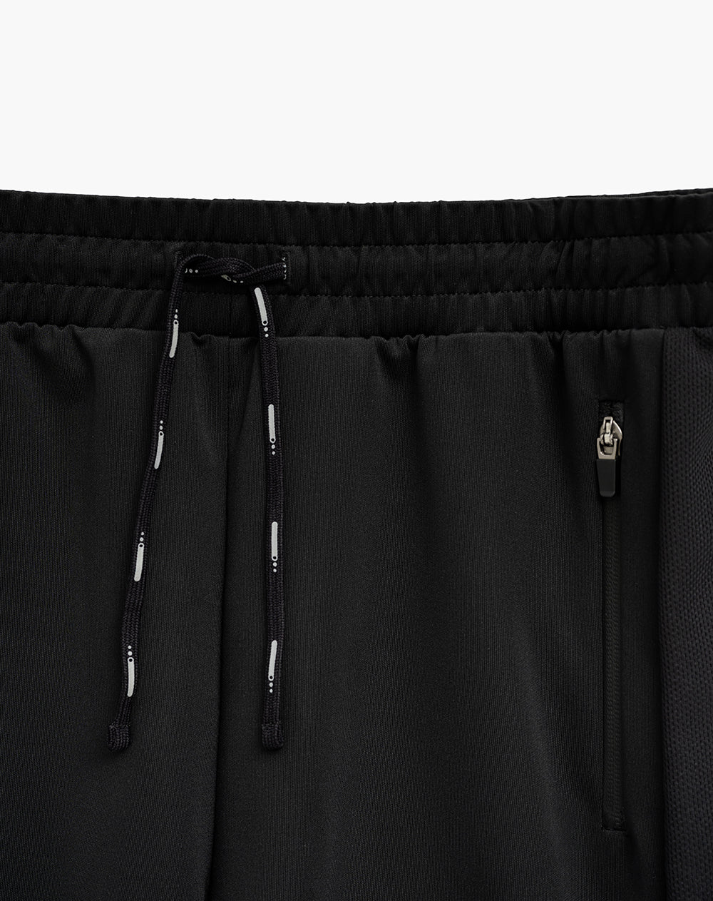 Pantaloneta deportiva control humedad negra hombre