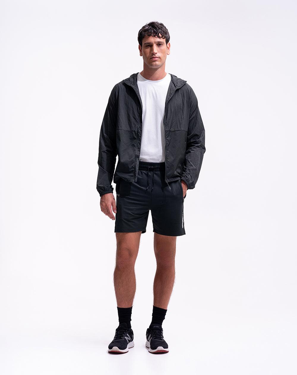 Pantaloneta deportiva control humedad negra hombre