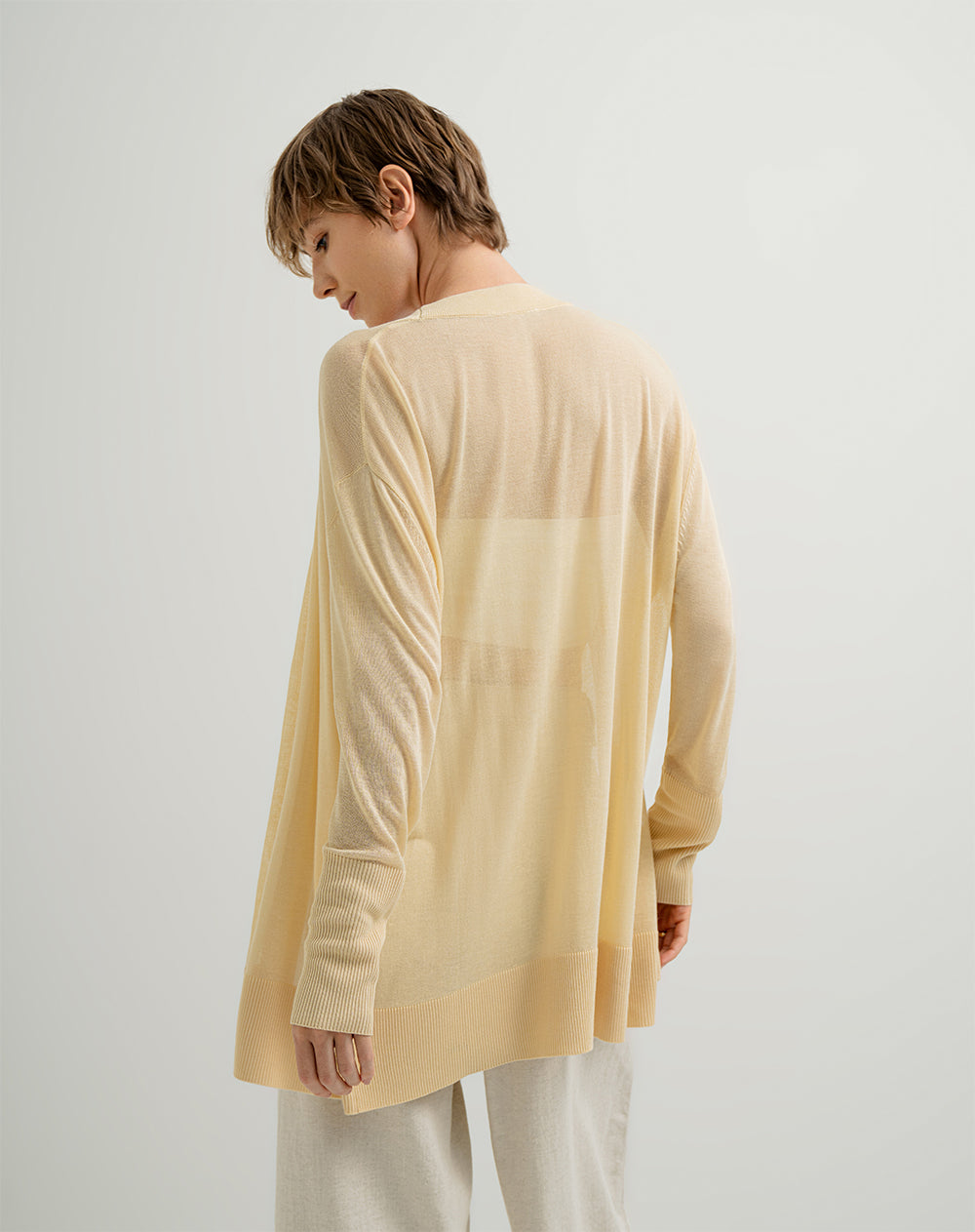 Buzo oversize tejido de punto amarillo mujer