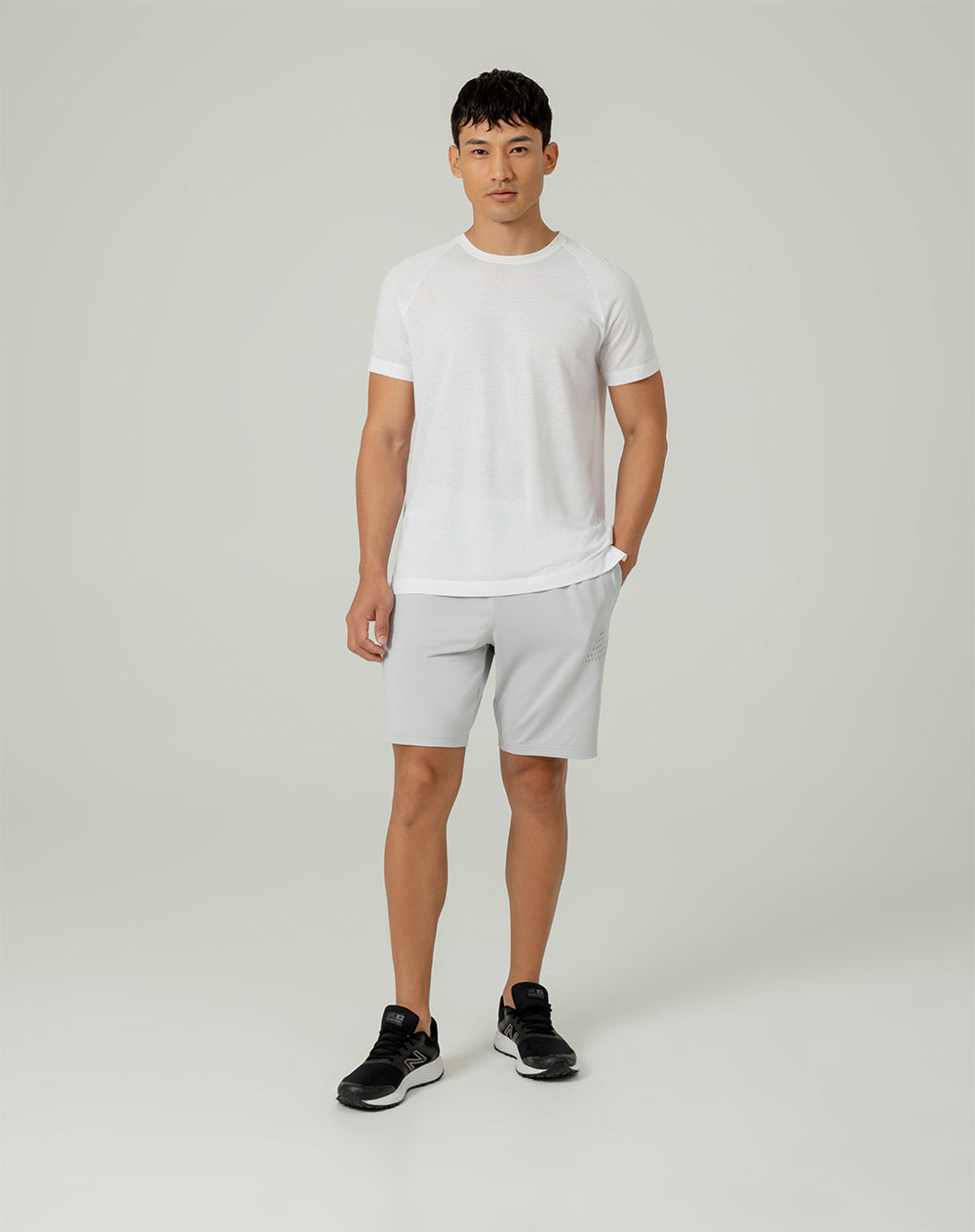 Pantaloneta deportiva control humedad gris hombre