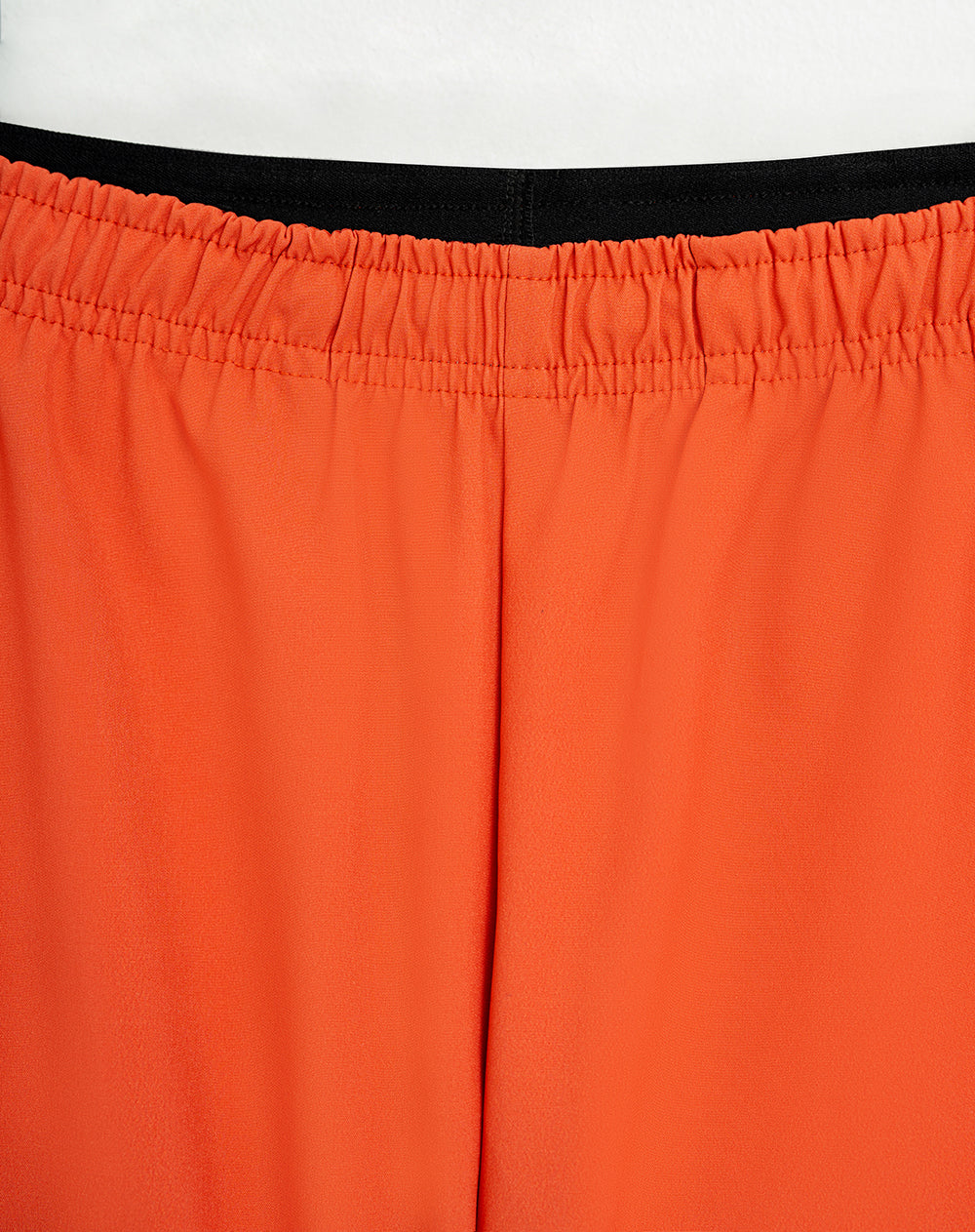 Pantaloneta deportiva malla interna naranja hombre