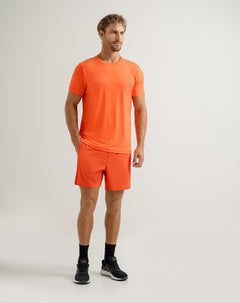 Pantaloneta deportiva malla interna naranja hombre