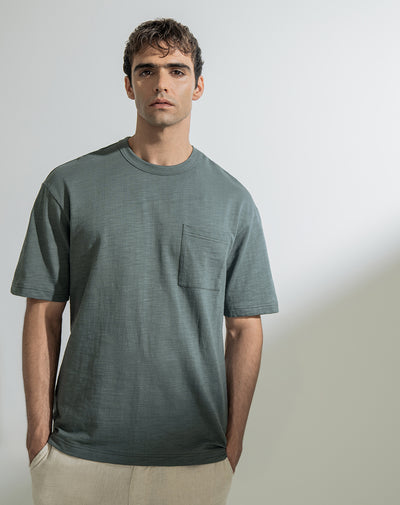 Camiseta regular algodón bolsillo frontal verde hombre