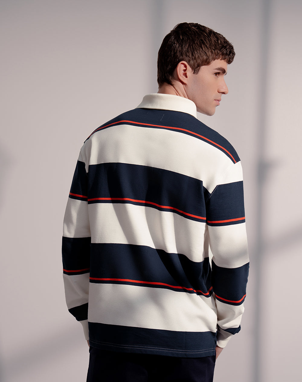 Polo regular fit azul con rayas