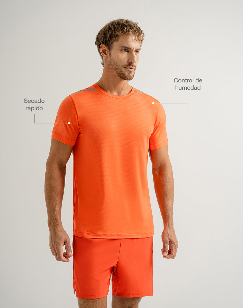 Camiseta deportiva control humedad naranja hombre