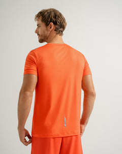 Camiseta deportiva hombre control humedad naranja