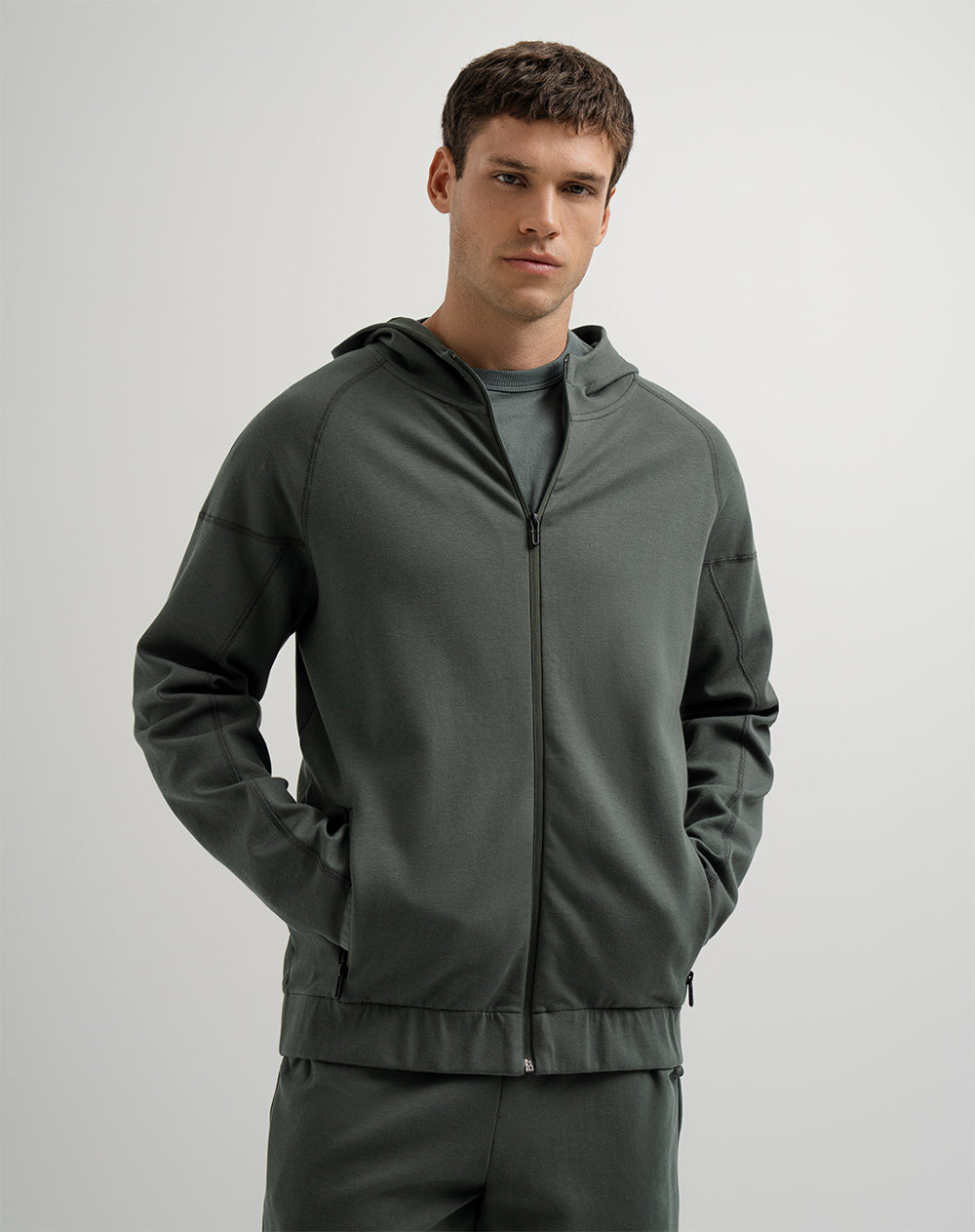 Chaqueta en algodón sostenible con cierre y capucha verde oscuro hombre