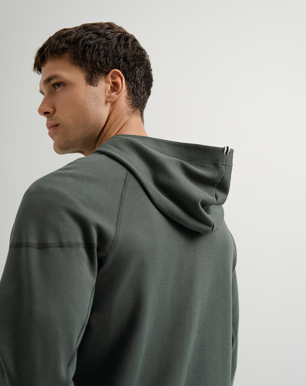 Chaqueta en algodón sostenible con cierre y capucha verde oscuro hombre