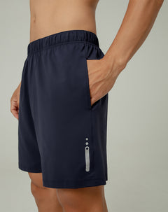 Pantaloneta deportiva control humedad azul hombre