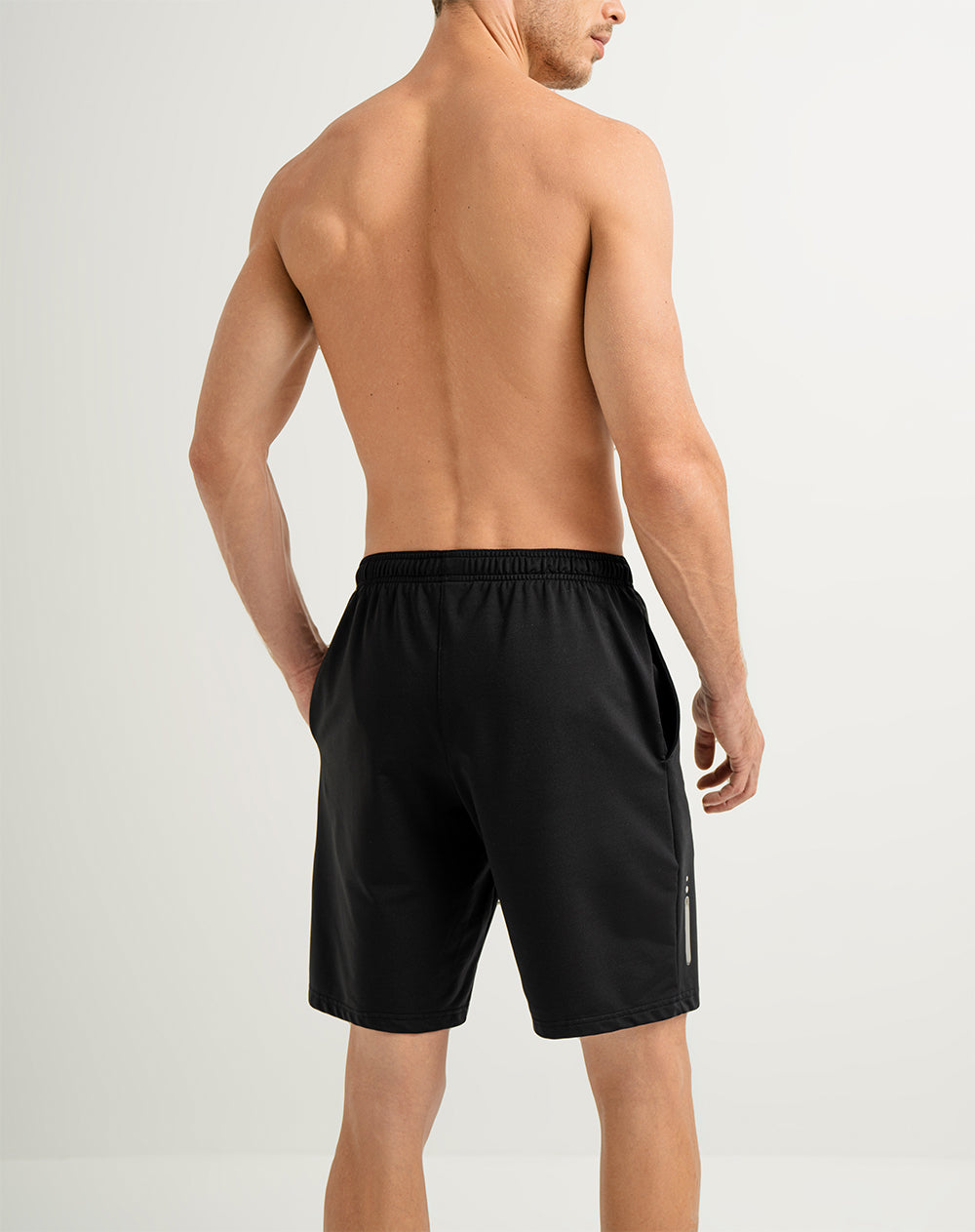 Pantaloneta deportiva control humedad negra hombre