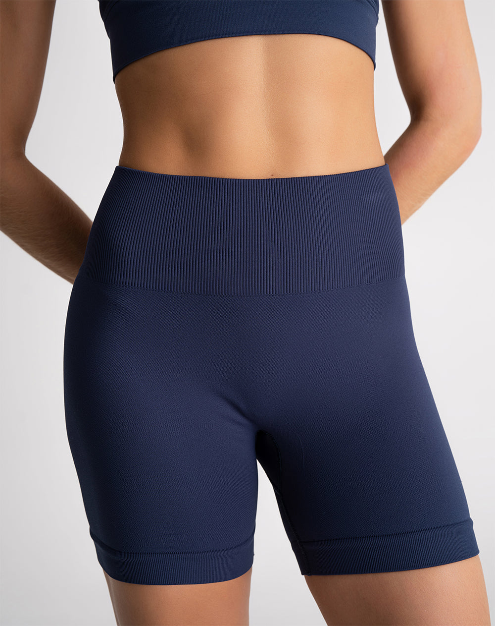 Biker deportivo seamless control abdomen azul mujer