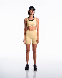 Biker deportivo seamless control abdomen amarillo mujer