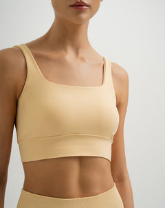 Top deportivo soporte medio seamless amarillo