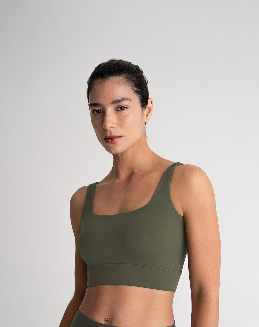 Top deportivo soporte medio seamless antibacterial verde