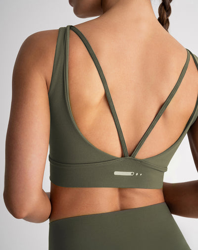 Top deportivo soporte medio seamless antibacterial verde