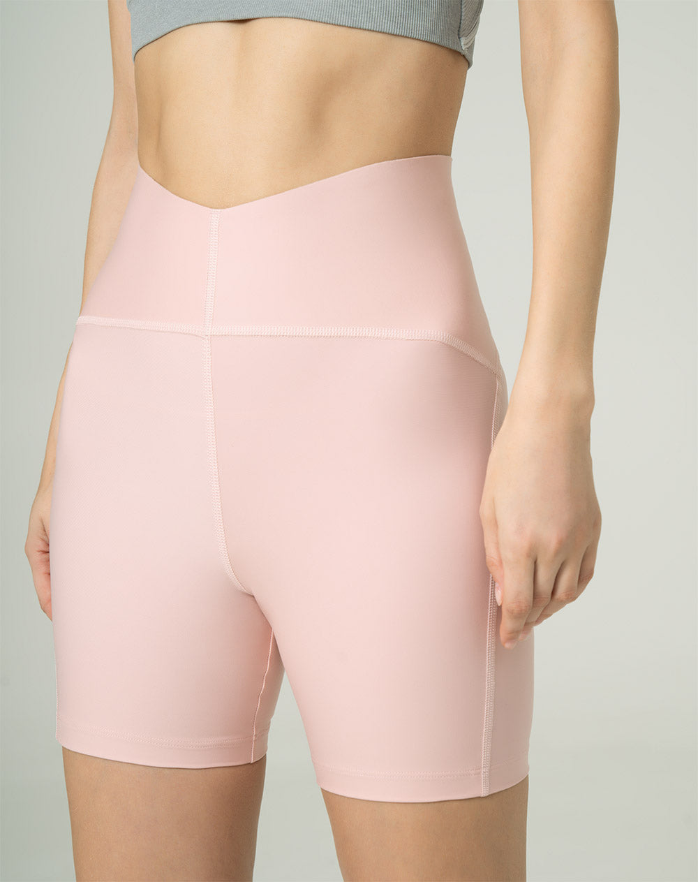 Biker deportivo tiro alto control abdomen rosa mujer