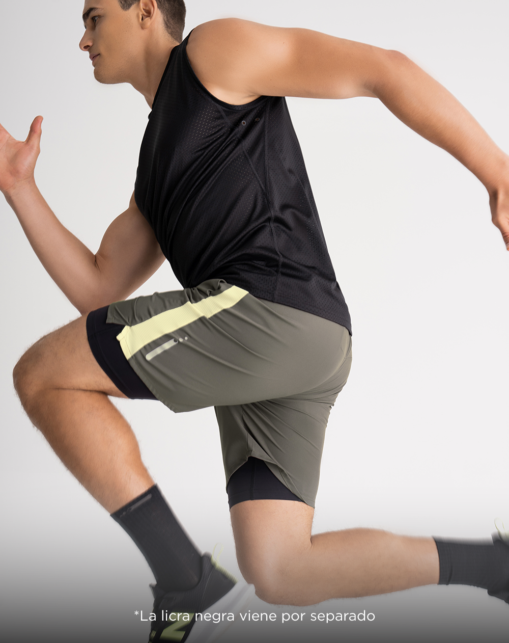 Pantaloneta deportiva secado rápido verde hombre