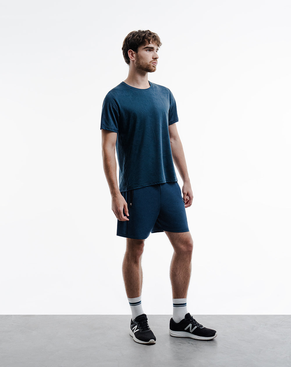 Pantaloneta deportiva control humedad azul hombre