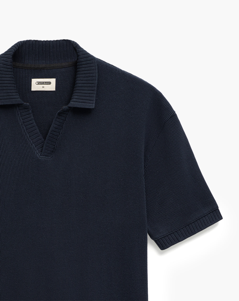 Polo regular tejida azul hombre