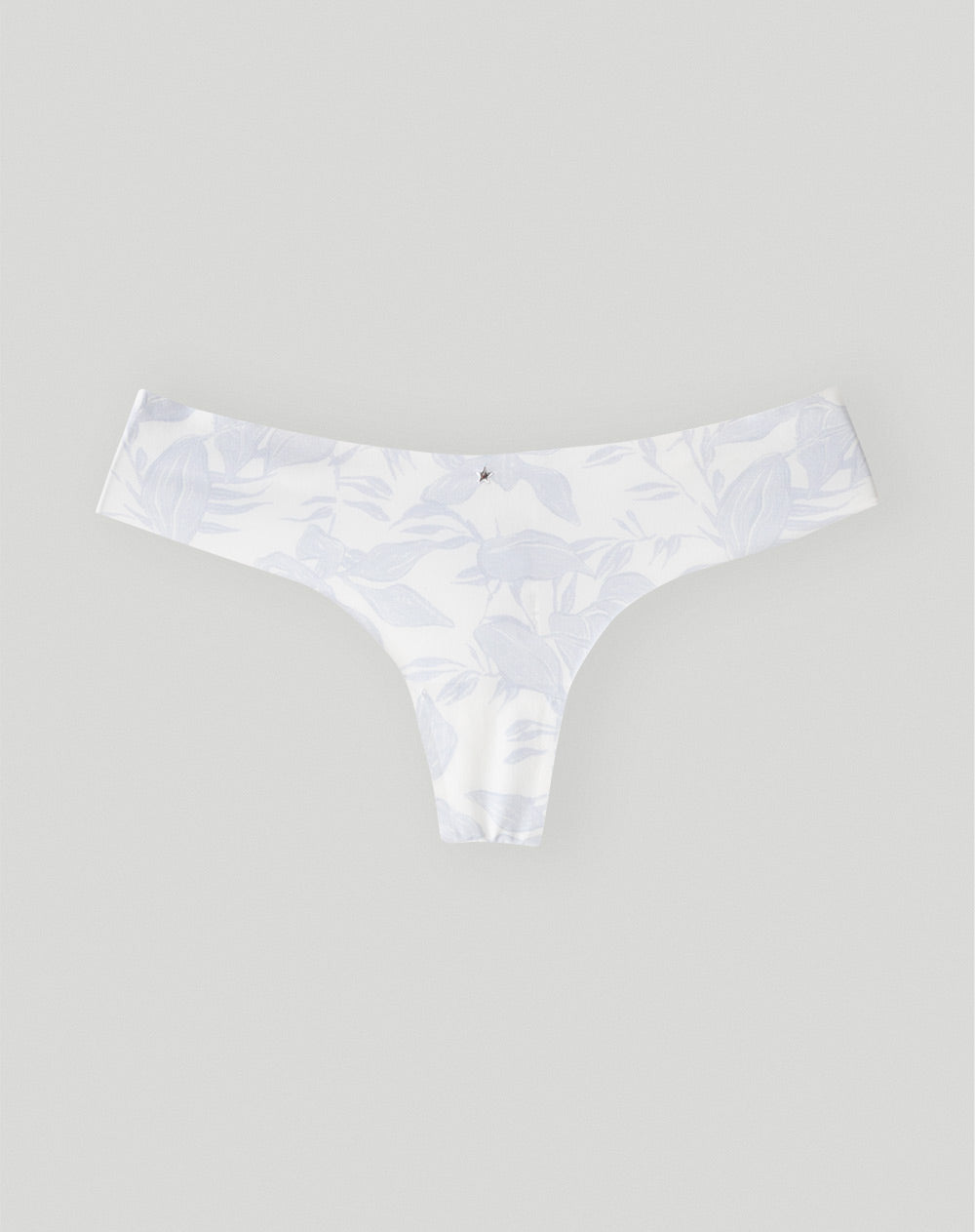 Panty tipo tanga microfibra invisible blanco estampado