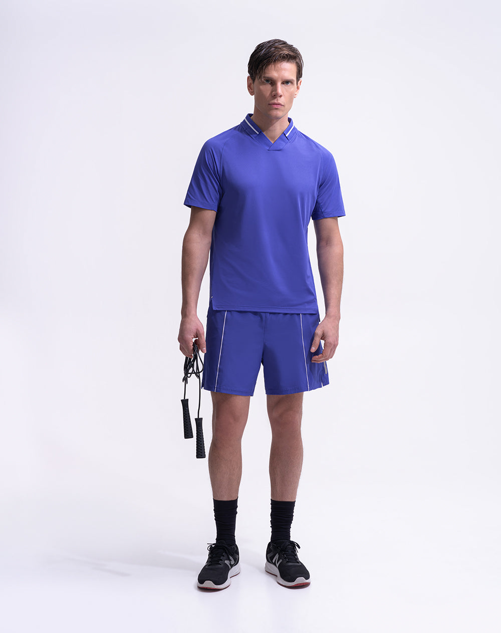 Camiseta deportiva tipo polo control humedad azul hombre