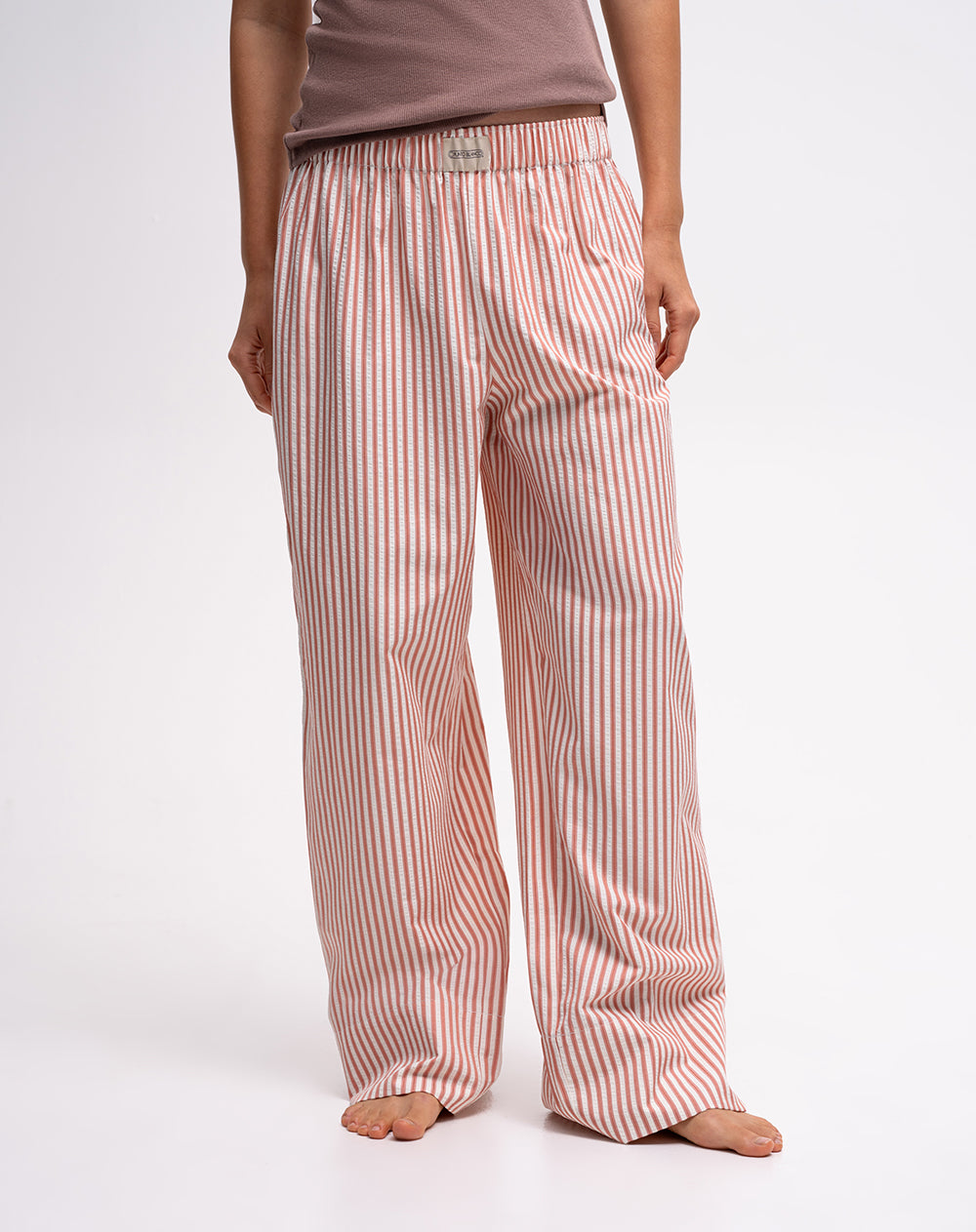 Pantalón relaxed fit tiro alto rosado rayas
