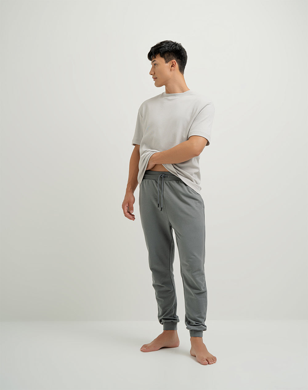 Jogger en algodón sostenible semi ajustado gris para hombre