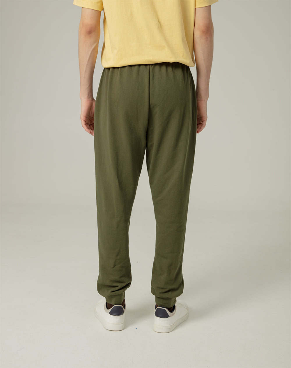 Jogger en algodón sostenible semi ajustado verde para hombre