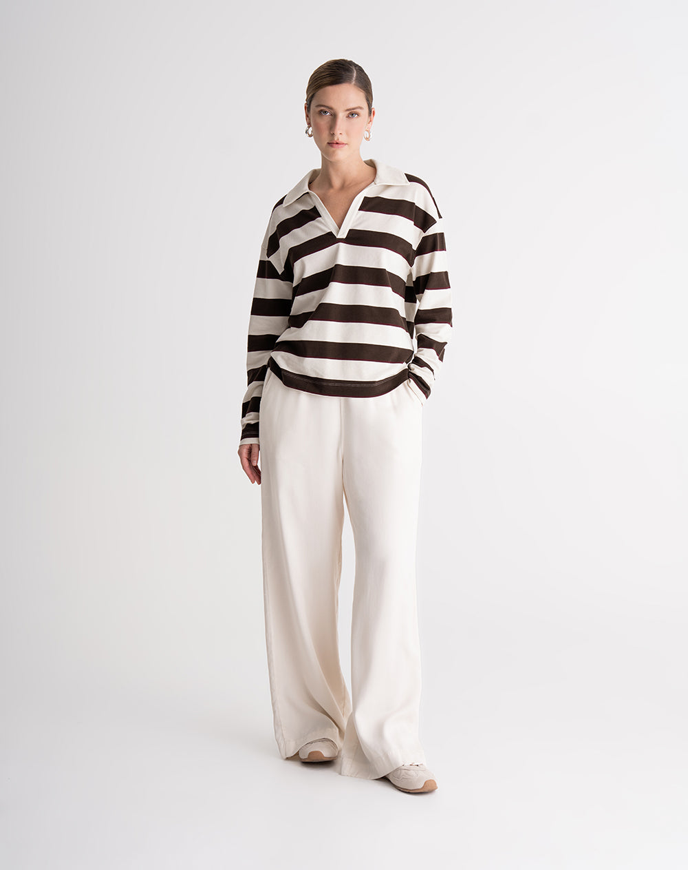 Buzo relaxed fit cafe rayas